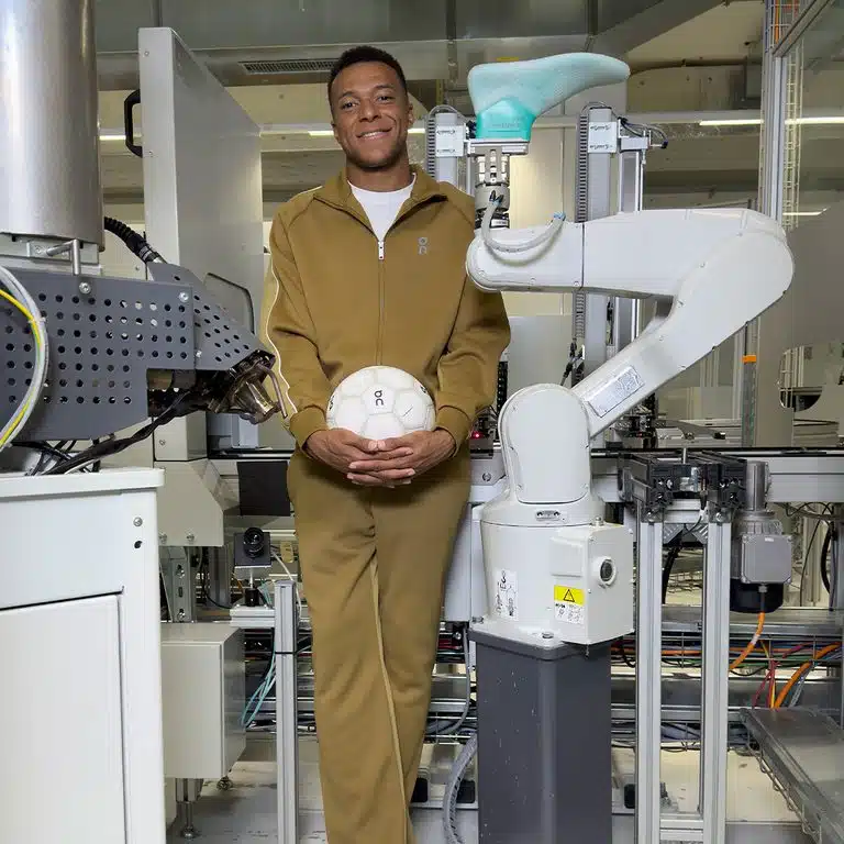 Kylian Mbappé training in a laced On football boot prototype